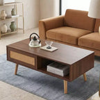 Table basse en rotin PE avec rangement à porte coulissante et pieds en bois massif - Noyer