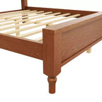 Lit plateforme en bois avec tête de lit capitonnée