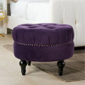 Pouf rond capitonné